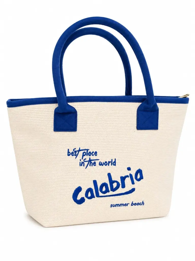 Borsa mare calabria tessuto intrecciato avorio con manici blu e scritta summer beach