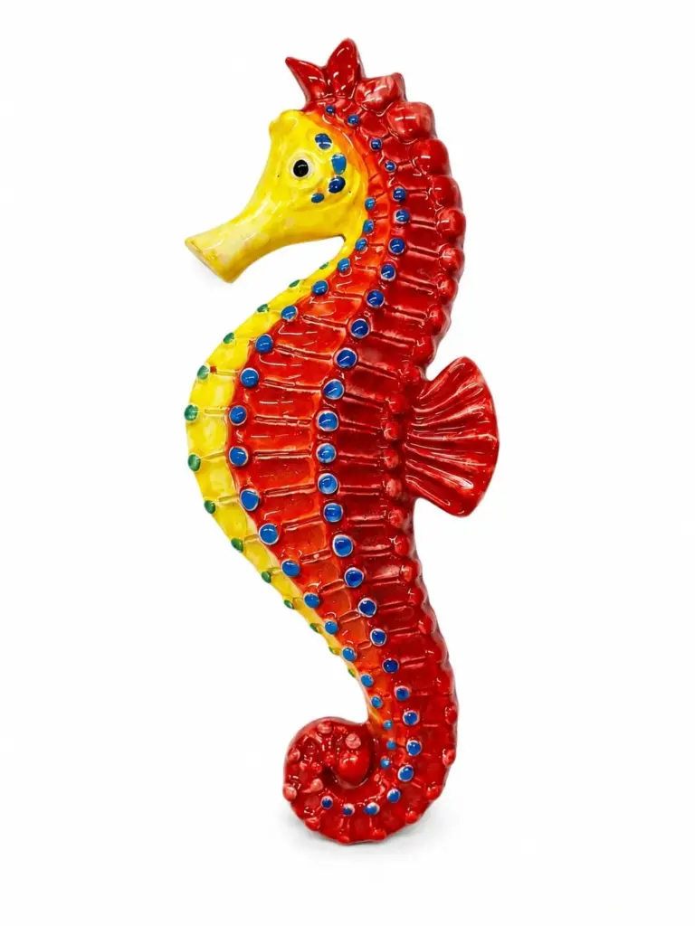Statuetta ceramica cavalluccio marino rosso giallo con decorazioni blu verdi in rilievo
