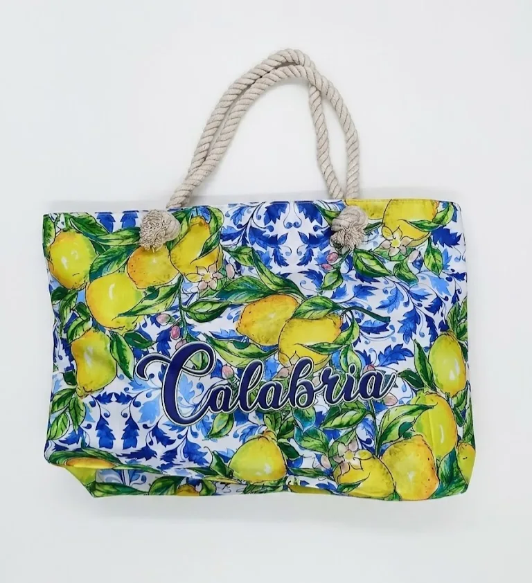 Borsa mare calabria limoni gialli con manici corda intrecciata e scritta corsivo blu