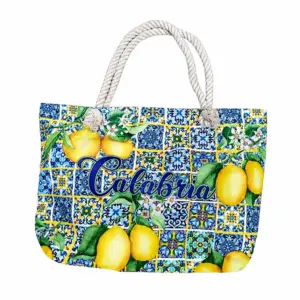 Borsa mare calabria limoni maiolica con manici corda intrecciata bianca su sfondo bianco