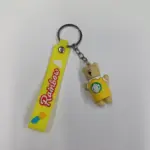 Portachiavi giallo con orsetto beige in maglietta Starbucks e ciondolo Rainbow decorato