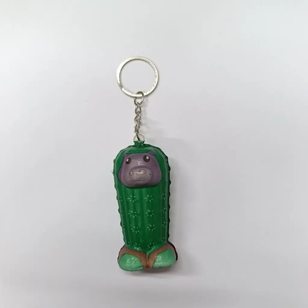 Portachiavi ippopotamo cactus in resina verde smeraldo con fiori decorativi e viso sorridente