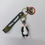 Portachiavi Looney Tunes Silvestro gomma bianco nero con anello dorato e charm rosso giallo