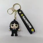 Portachiavi Mercoledì Addams con ciondolo in gomma e fascetta nera Rainbow con stelle gialle