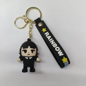 Portachiavi Mercoledì Addams con ciondolo in gomma e fascetta nera Rainbow con stelle gialle