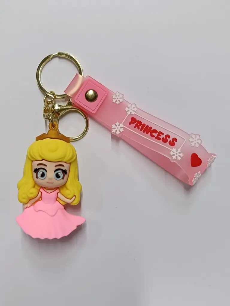 Portachiavi principessa Disney Aurora in gomma rosa con targhetta Princess e anello dorato