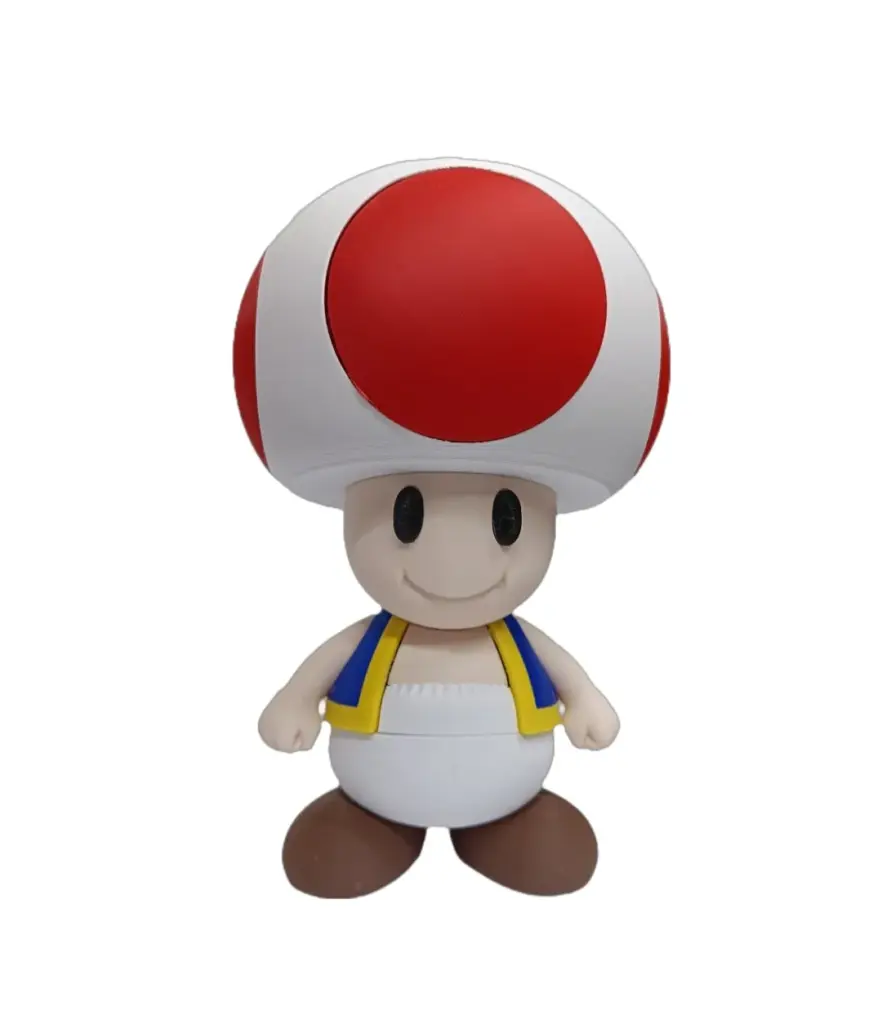 Statuetta toad super mario in plastica con cappello rosso bianco e salopette gialla blu