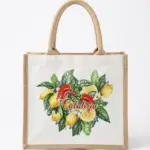 Shopper in tessuto bianco e juta naturale con stampa di limoni gialli, peperoncini rossi, foglie verdi e scritta Calabria in corsivo