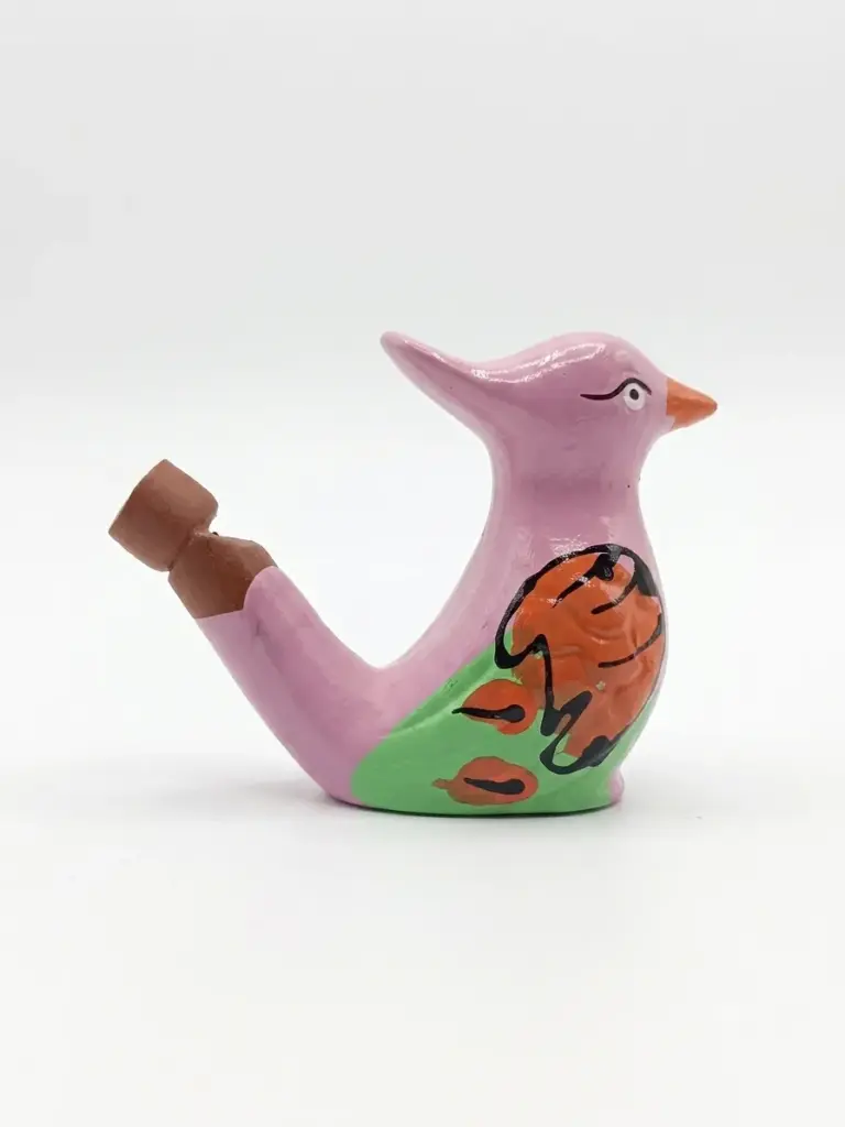 Fischietto ad acqua in ceramica a forma di uccellino rosa con becco arancione, decorazione floreale arancione e verde sul corpo e tappo sul dorso