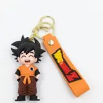 Portachiavi Dragon Ball Z con ciondolo gomma Son Goku divisa arancione e fascetta similpelle