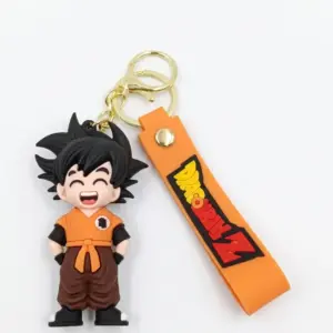 Portachiavi Dragon Ball Z con ciondolo gomma Son Goku divisa arancione e fascetta similpelle