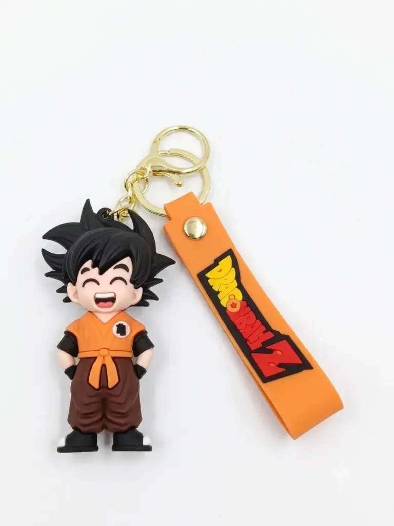 Portachiavi Dragon Ball Z con ciondolo gomma Son Goku divisa arancione e fascetta similpelle