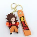 Portachiavi con miniatura chibi Goku Super Saiyan 4 in PVC arancione e castano, ciondolo arancione con logo Dragon Ball Z in giallo e rosso