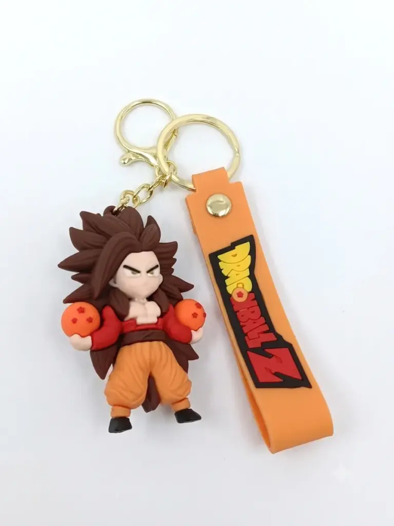 Portachiavi con miniatura chibi Goku Super Saiyan 4 in PVC arancione e castano, ciondolo arancione con logo Dragon Ball Z in giallo e rosso
