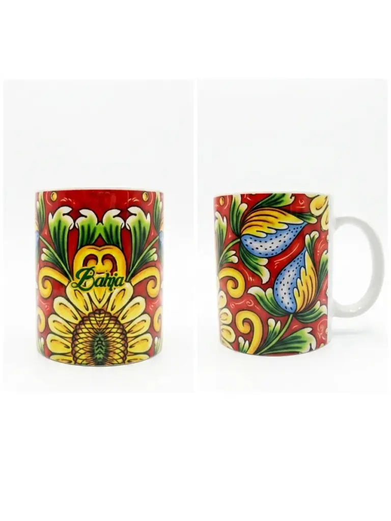 Tazza ceramica fondo rosso con manico bianco, girasole giallo, foglie verdi, elementi azzurri a goccia, volute dorate e scritta Bahja